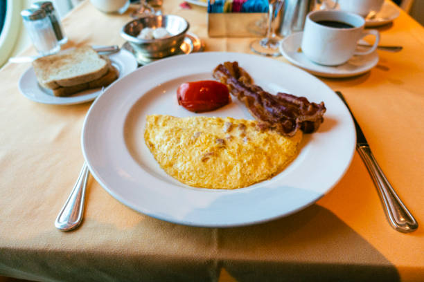 Yummy and colorful veggie omelette with mushrooms and cheese