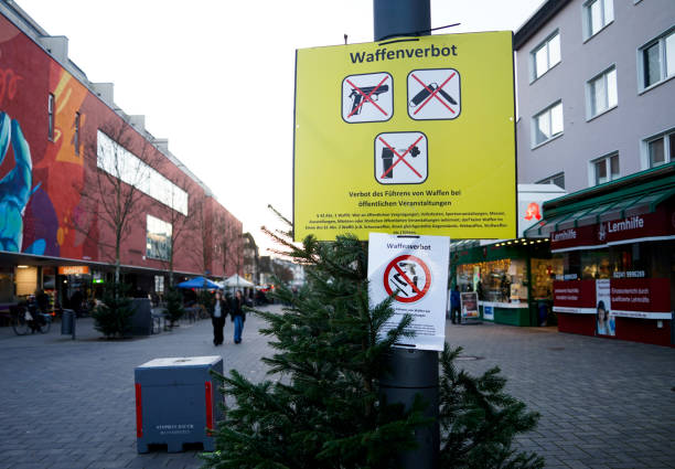 Troisdorf, Germany. Weapons ban notice in German lettering Waffenverbot in a german pedestrian zone during the Christmas market. November 29, 2024