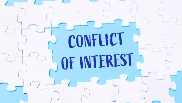 istock Jigsaw puzzle with the word conflict of interest 2187611421
