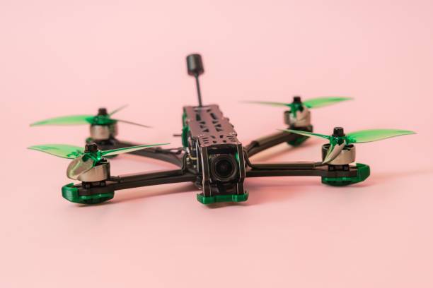 istock Close up view on modern drone with camera isolated on pink background 2187614764