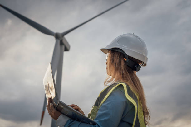 istock An engineer is actively monitoring the operations of wind turbines using a laptop while working in the renewable energy field, ensuring efficiency and performance in sustainable energy production 2187615810