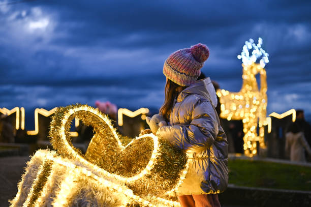 istock Child enjoying Christmas lights. 2187616705