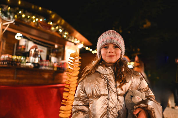 istock Cute girl with potato chips. 2187616736