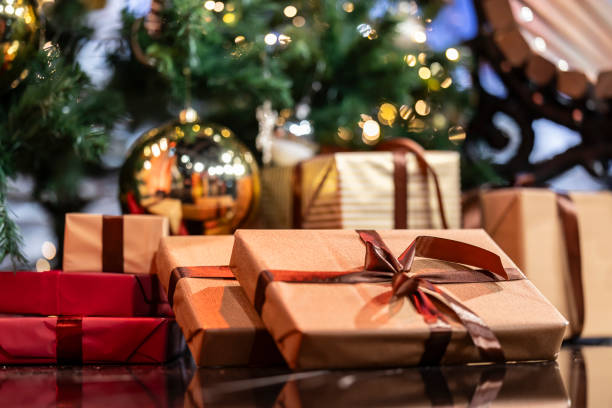 istock Beautiful wrapped gifts under the Christmas Tree 2187619780