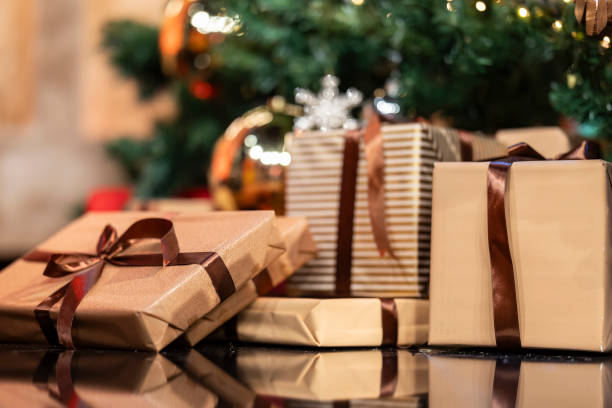 istock Beautiful wrapped gifts under the Christmas Tree 2187620755