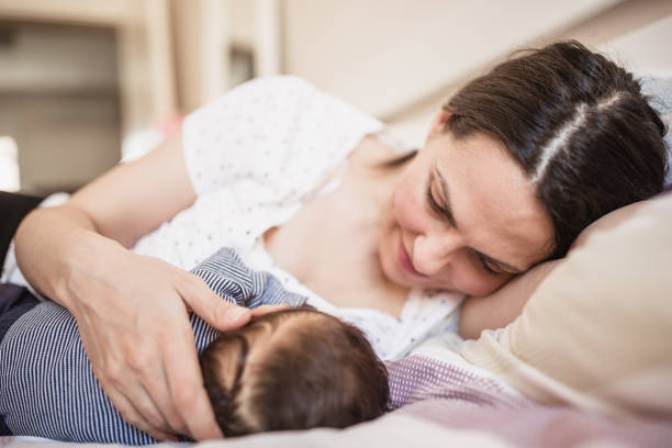 istock Mother Breastfeeding Her Baby 2187626187