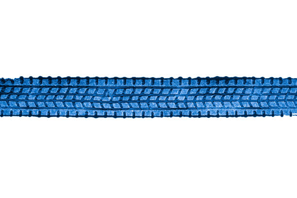 blue traces of tractor tires on white background