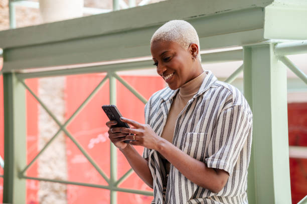 istock Confident black entrepreneur woman talking on cell phone 2187637304