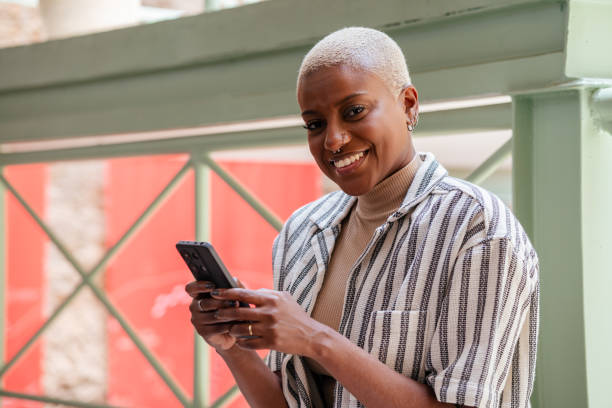 istock Confident black entrepreneur woman talking on cell phone 2187637317