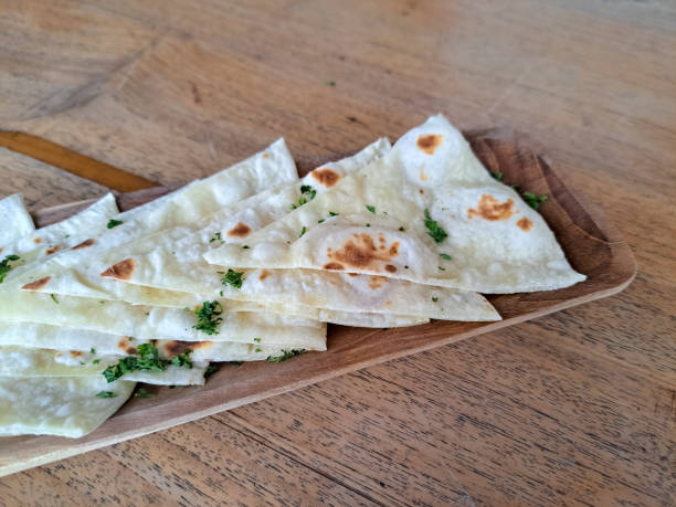 Tasty Naan Bread On A Wooden Board Plate. Middle Eastern Food Menu.