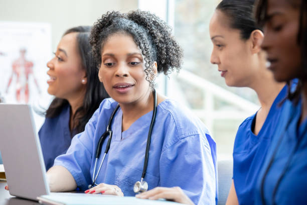 istock Discussions are underway among nursing students in the classroom. 2187642940