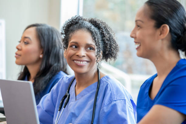 istock Several female students pursuing medical studies attend a class and join in discussions. 2187642955