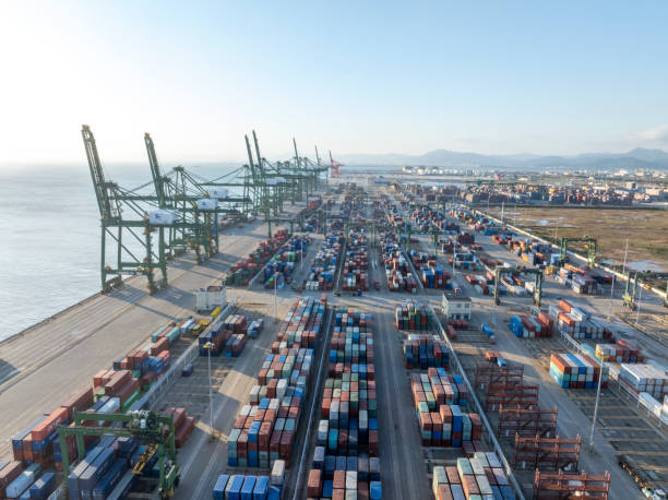 istock Containers placed on the commercial dock at the seaside 2187643398