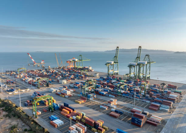 istock Containers placed on the commercial dock at the seaside 2187643407