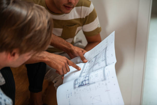 istock Diverse Team Engaged in Home Renovation Planning 2187646473