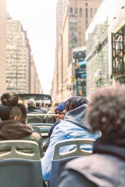 istock Urban Tourists on Double-Decker Bus in Cityscape during Daylight 2187646518