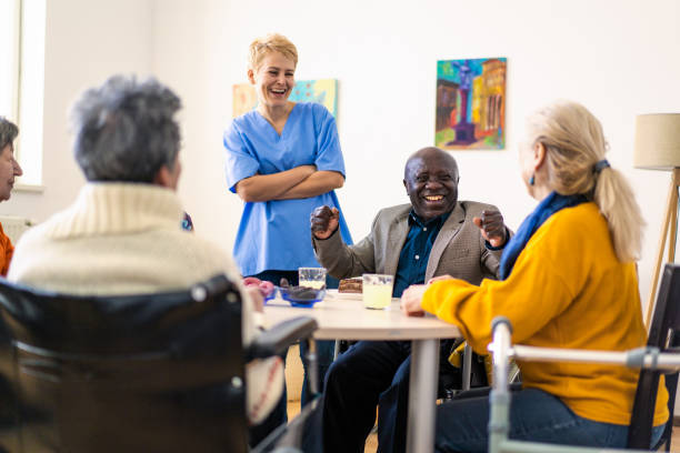 istock Care home residents sharing jokes 2187647524
