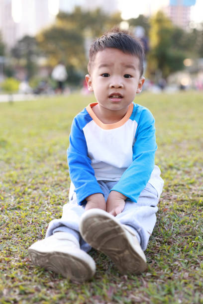 istock Cute children playing in the park 2187648177
