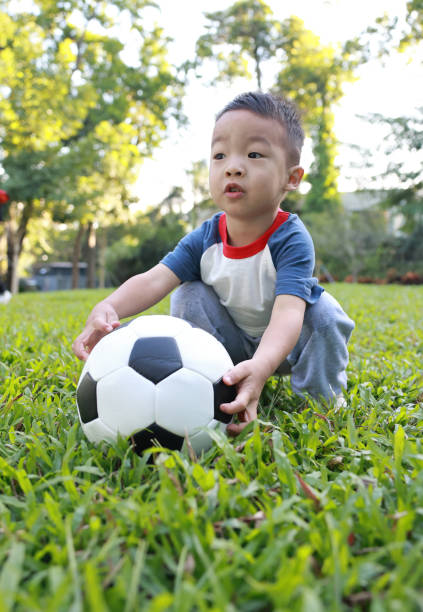 istock Boy with soccer ball 2187649692