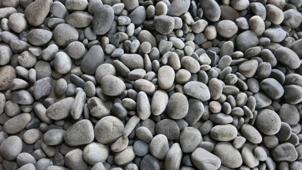 istock The background of pebbles arranged into a background 2187654272