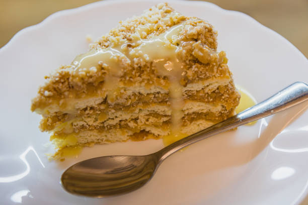 homemade apple cake on a white plate, close up High quality photo