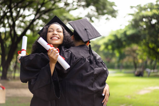 istock Happy and excited students in their graduation ceremony. 2187655915