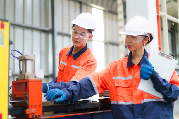 istock Industrial engineer team works together in factory. 2187656026