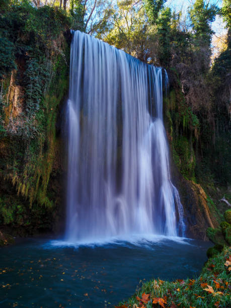 istock Scenic view of waterfall in forest,Monasterio de Piedra,Spain 2187658274
