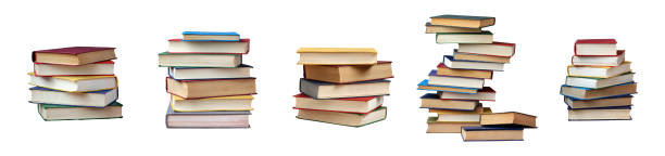 istock Stacks of various books arranged in different formations showcasing diverse colors and sizes on a clean a white background 2187662333