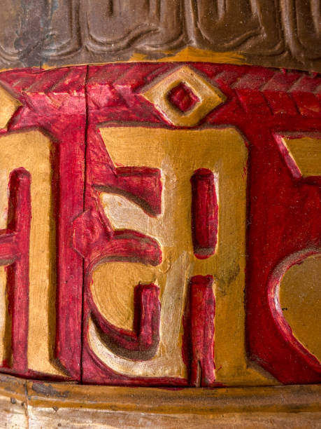 istock A gold and red prayer wheel with writing in a foreign language, spiti valley, India 2187664412
