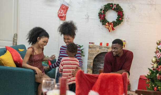 istock Festive Black Family Christmas Gathering and Celebration 2187668855