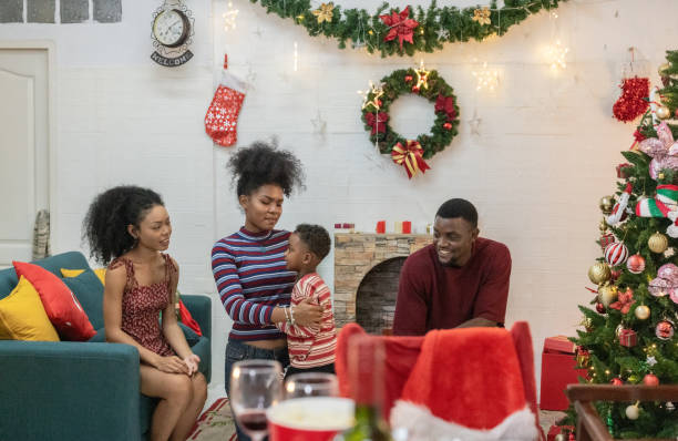 istock Festive Black Family Christmas Gathering and Celebration 2187669083
