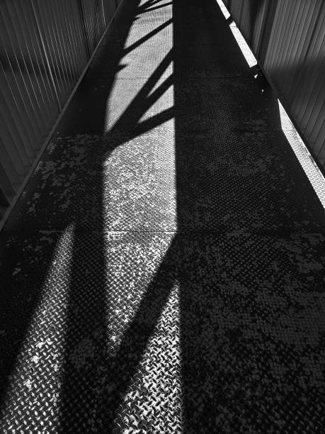 istock Abstract Shadows and Textures on an Industrial Walkway 2187669902