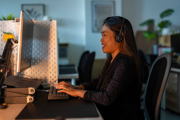 istock Female Filipino Call Centre Worker 2187670409