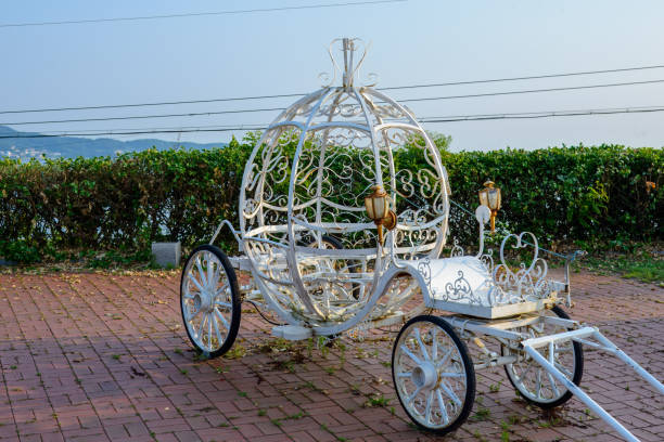 a white carriage with an antique lantern.