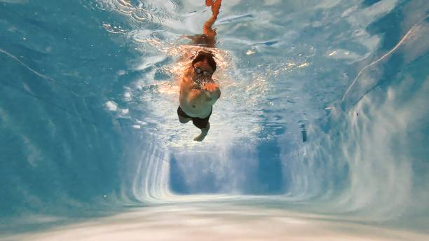 istock Asian Male Athlete Swimming 2187677685