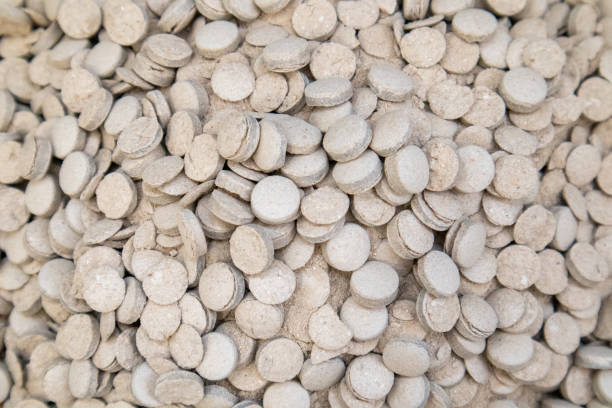 A pile of white agricultural fertilizer pellets