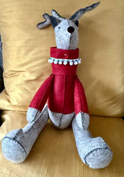 Reindeer in red jumper with moveable limbs. Hand stitched by myself