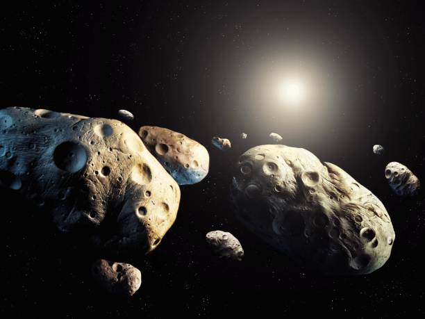 istock Asteroid belt isolated. Asteroid field. Space rocks in space. 2187693377
