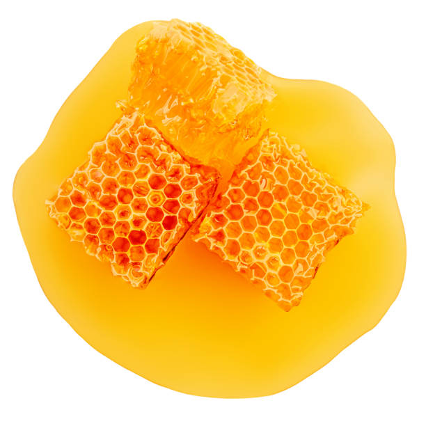 istock Honeycomb with flowing honey syrup isolated on white background. Honey Flat lay. Top view. Flat lay. Package design elements 2187693642