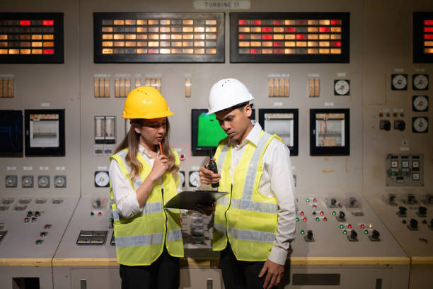 istock As the energy industry evolves, Asian male and female engineers focus on creating power plants that provide reliable energy to the world while minimizing environmental impact. 2187694597
