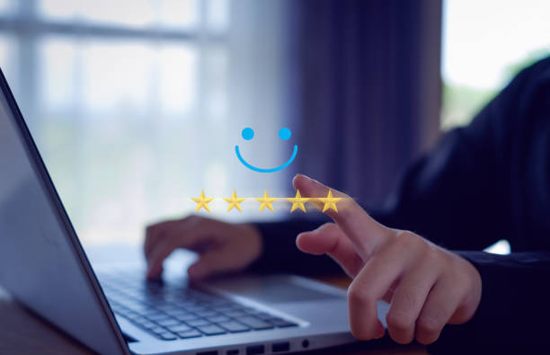 istock Hand with thumb up Positive emotion smiley face icon and five star with copy space.Customer satisfaction concept. 2187704421