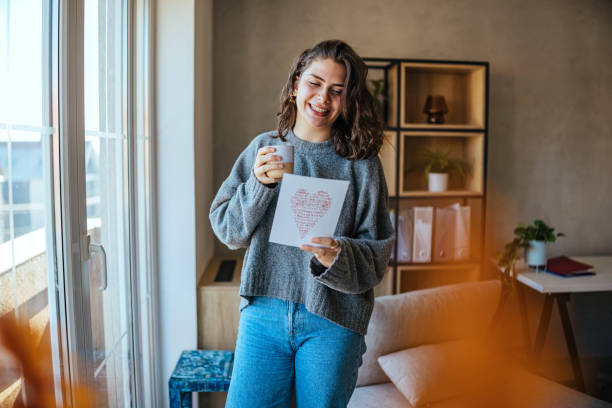 istock Woman enjoys reading a book 2187712819