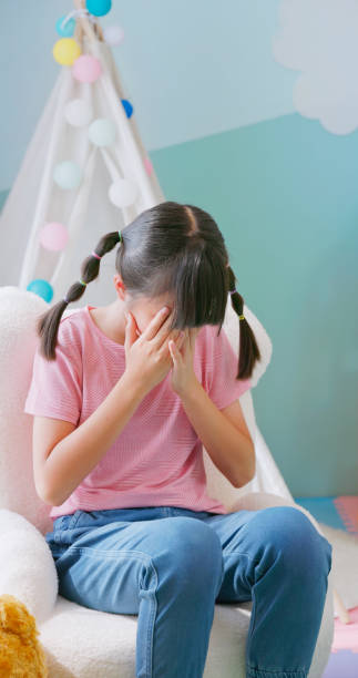 istock asian girl sad cry counseling 2187713196