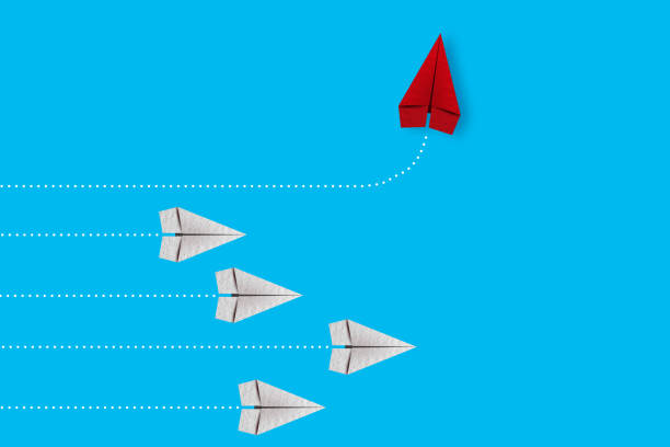 istock Red paper plane changing direction from white. new idea. different business concept. courage to risk. leadership. vector illustration 2187713549