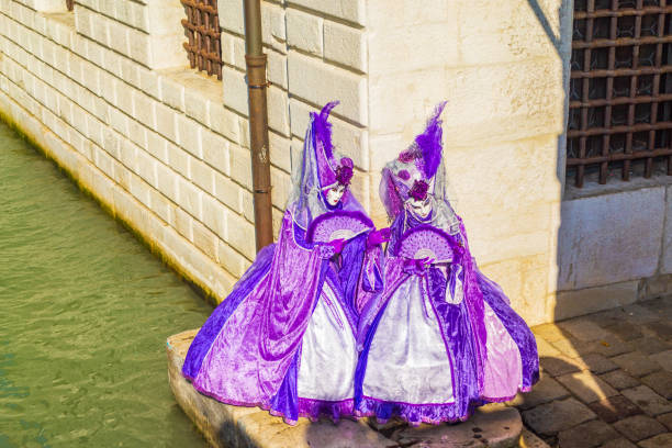 Venice, Italy - February 22, 2022: Person in Venetian costume attends the Carnival of Venice