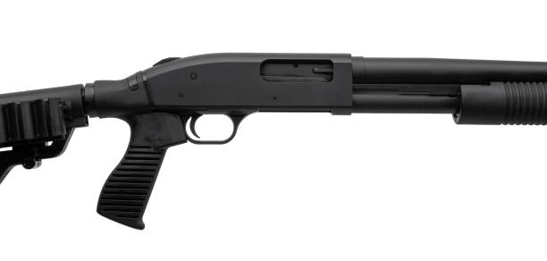 istock Pump-action 12 gauge shotgun isolated on a white background.  A smooth-bore weapon with a plastc stock. 2187716969