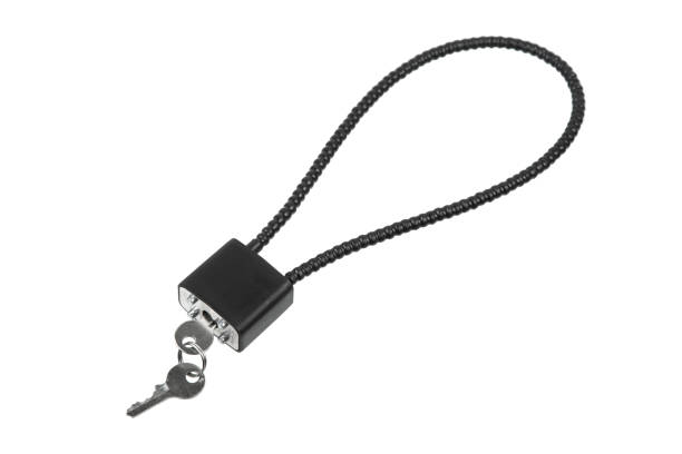 istock Locks and keys used to safely secure a firearm from being used. Weapon cable lock. Gun safety 2187716984