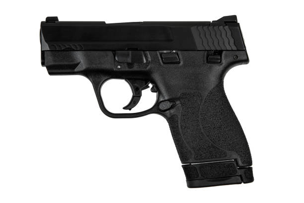 istock Modern semi-automatic pistol isolate on a white background. Armament for the army and police. Short-barreled weapon. 2187716990