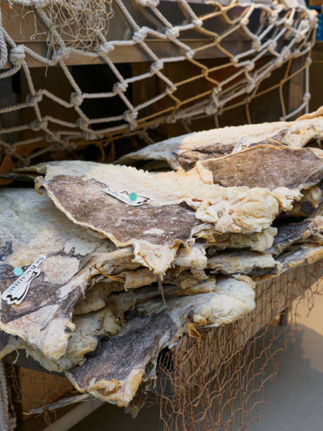 istock Pieces of salted cod on market stall. 2187717061